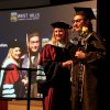 WHC Lemoore President Kristin Clark, with graduating students.